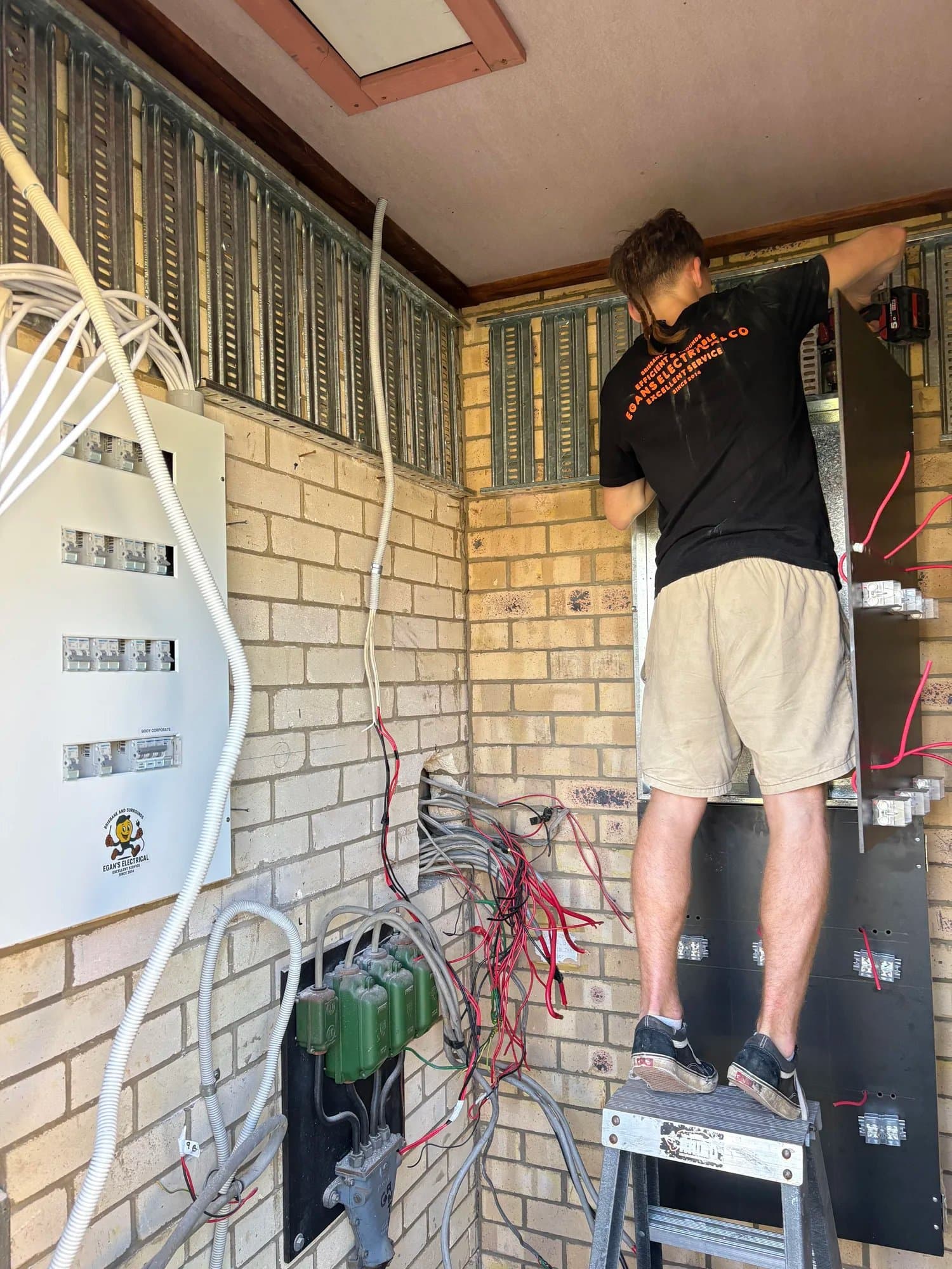 Michael working at an open switchboard